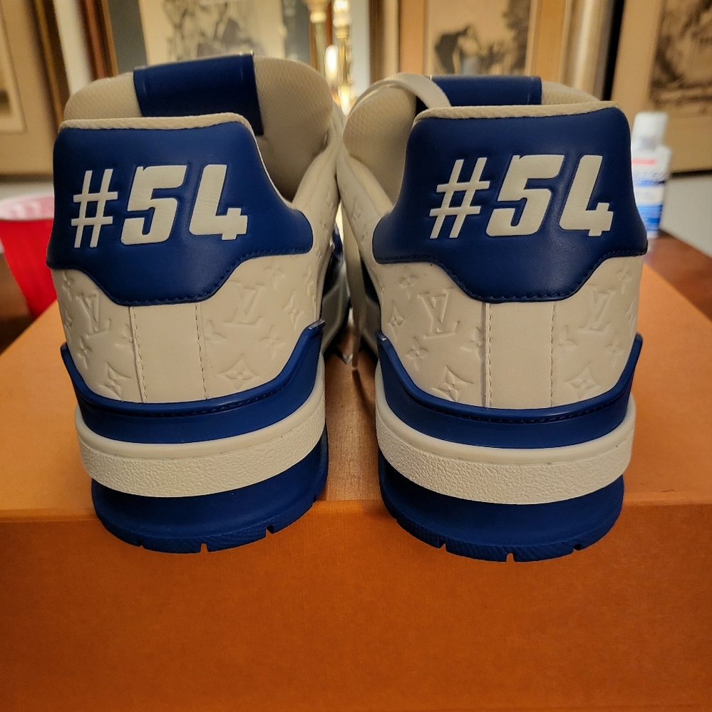 Louis Vuitton blue and white trainer sneaker. Size 8 1/2. NEVER WORN.